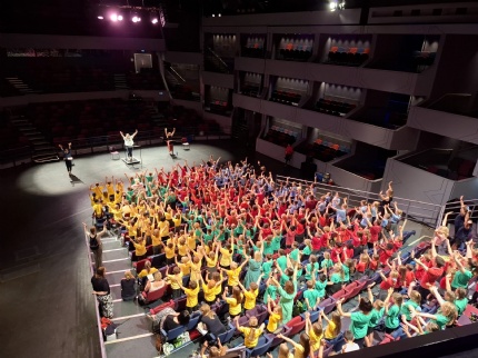 Over 700 pupils shine at annual Just Sing! event